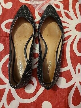 Coach "Rory" ballet flats in Peach Bisque with studded design